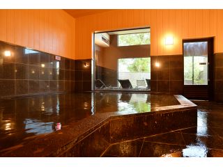 小高い丘にそびえる『白金の森』。阿蘇北外輪山に位置する鞍岳のふもと 菊池の地に 2018年4月グランドオープンしました。農のオーベルジュ。