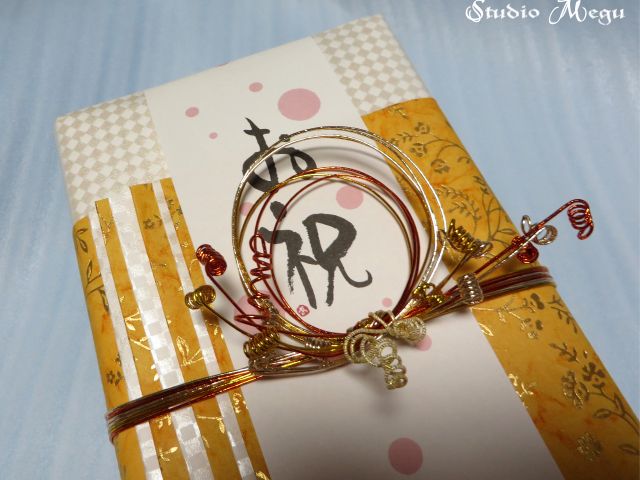 水引をあしらったお祝いラッピング