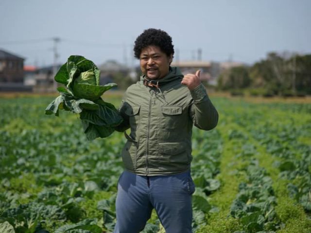 園主の坂尾英彦です!アフロがトレードマークです