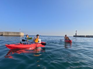 大阪湾を背景に記念写真