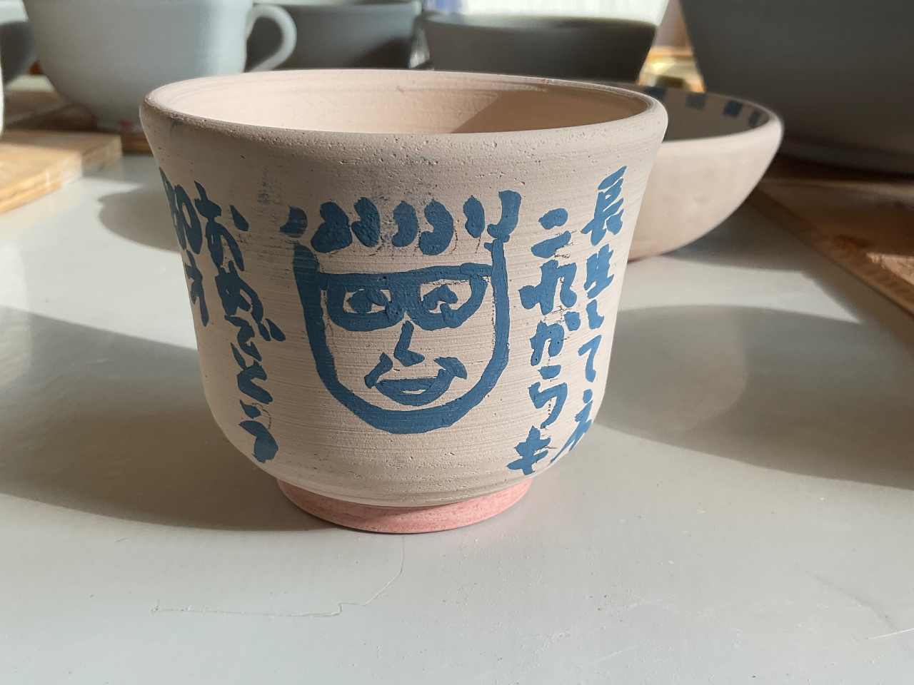 湯呑みに絵付けの例