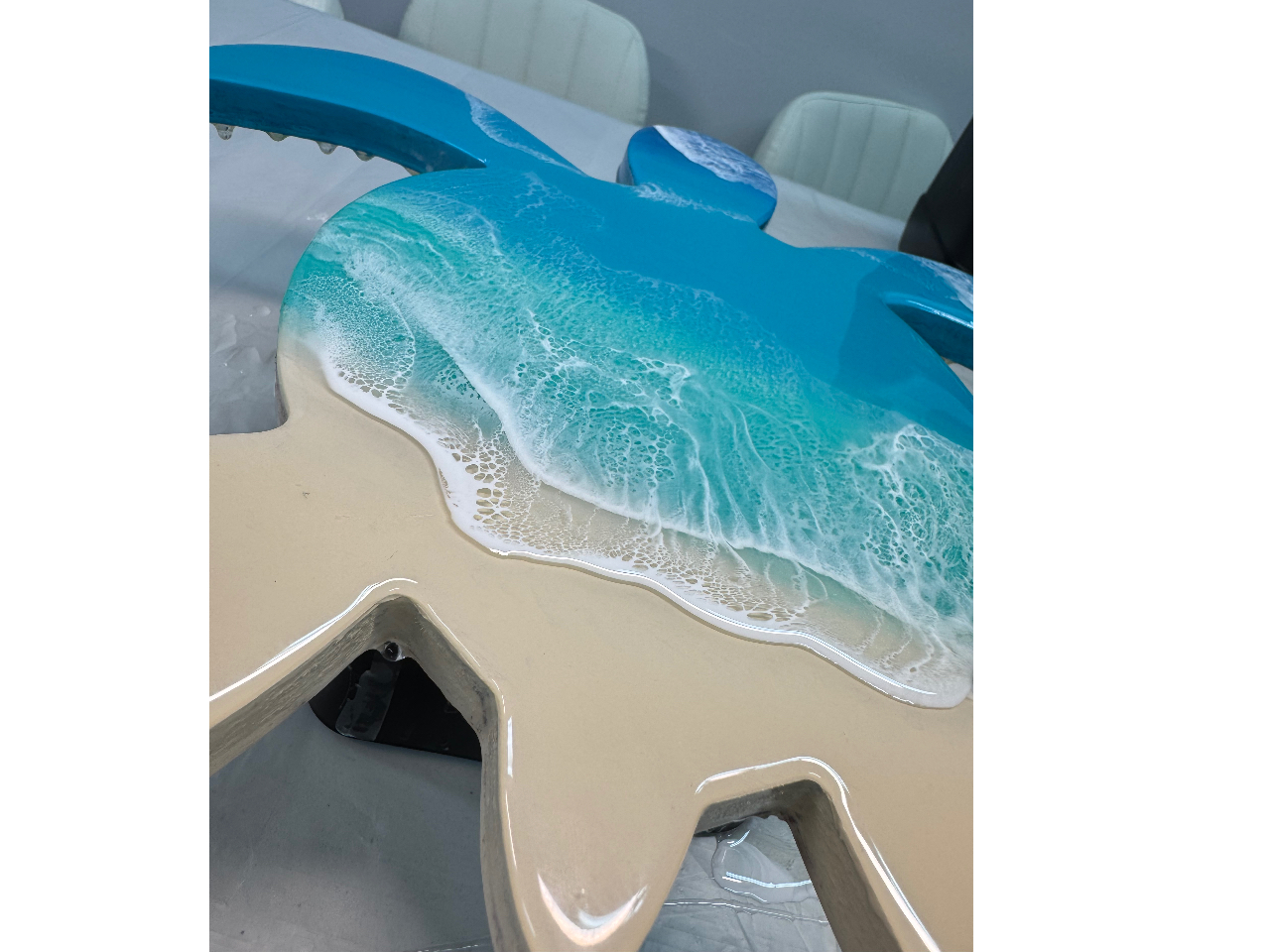 ���߂���