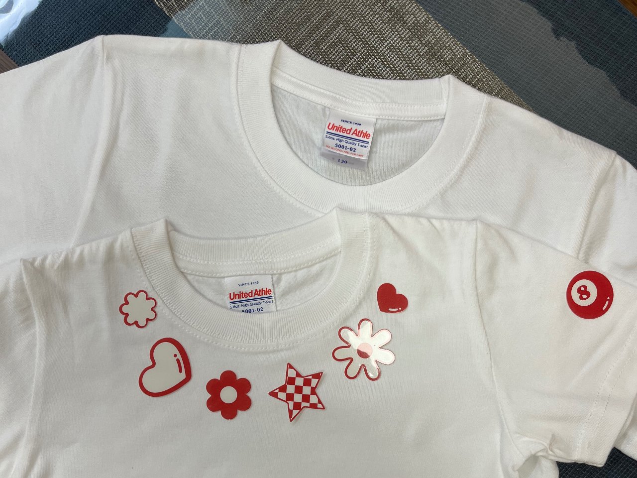 ������͎q����